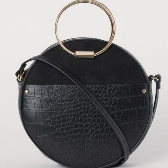 H&M Handbags - Elegant Black Circle Bag with Gold Handle